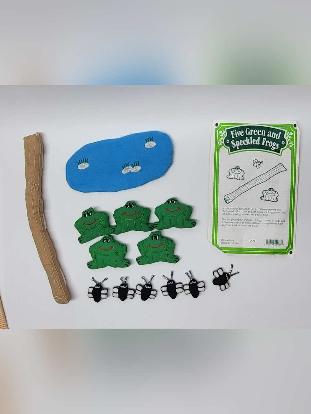 Five Green and Speckled Frogs" Sing-Along Kit by Lakeshore act out the classic s